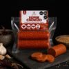 Súper Chorizo vegano de Parvati sobre fondo negro, vista hero